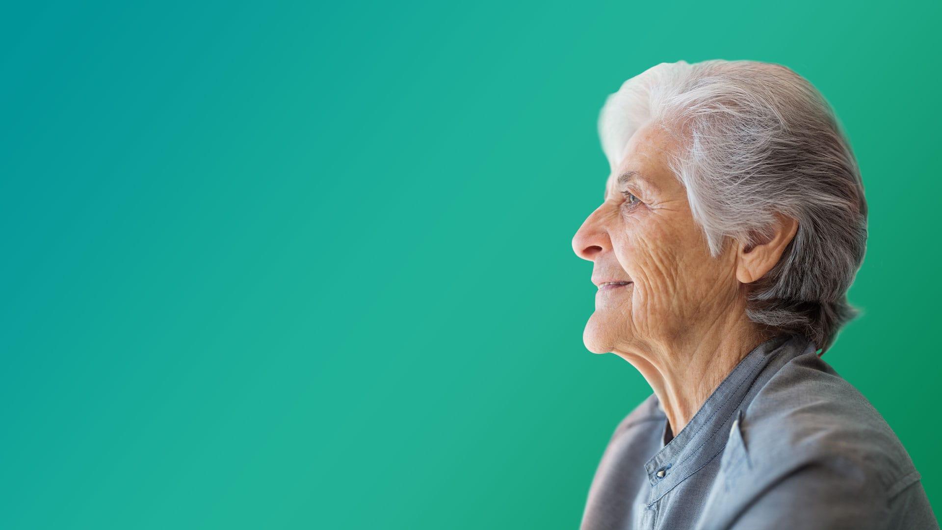 Image of an older woman looking to the left side of the screen